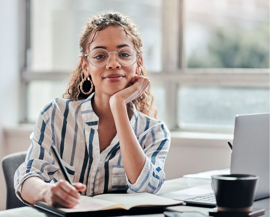 woman with glasses and striped shirt