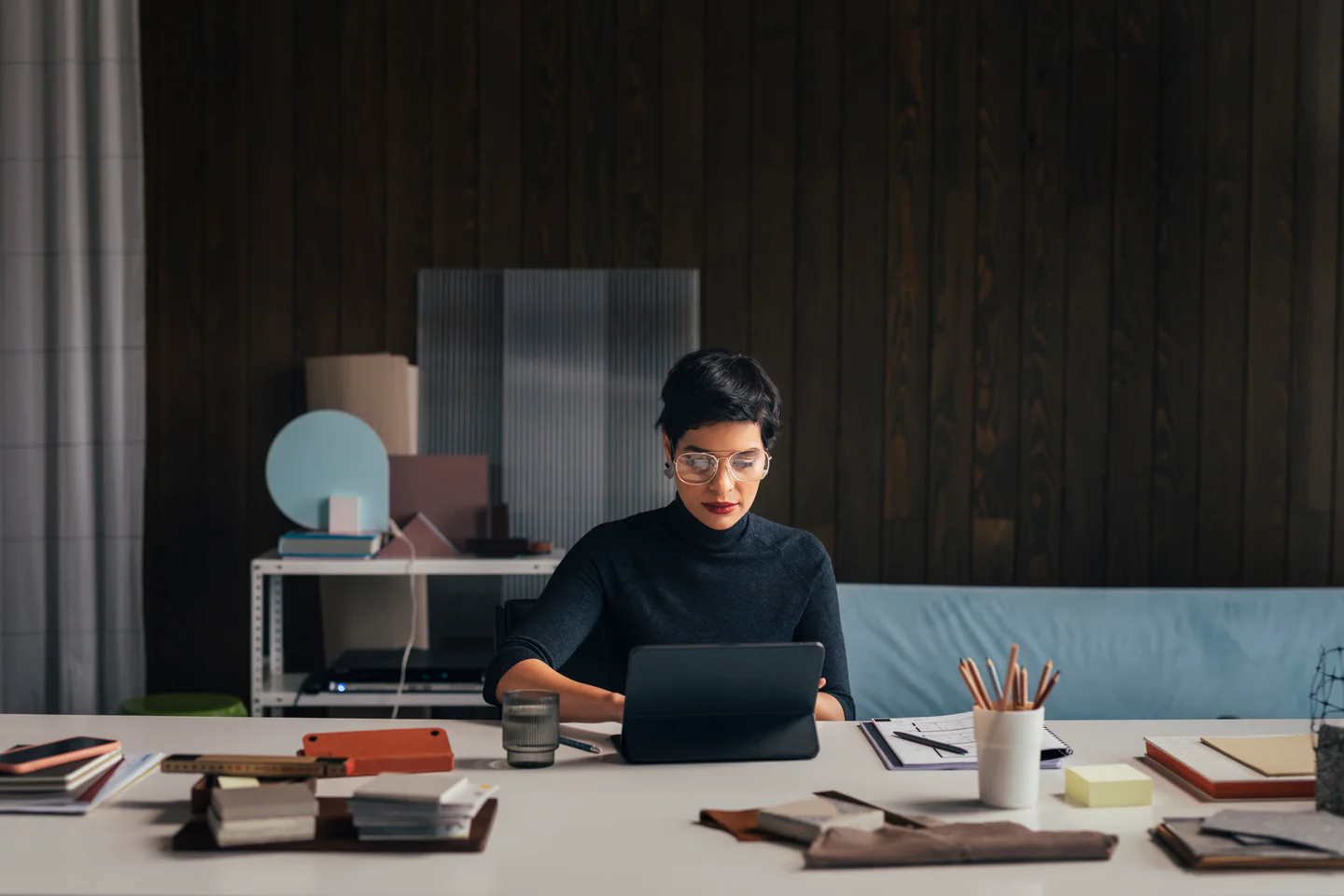 Portrayal of Capella student working at desk.