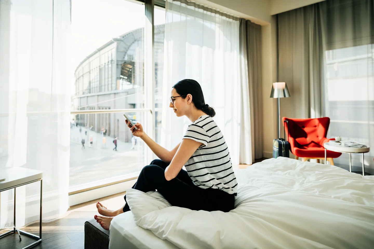 Portrayal of Capella online student using her phone.