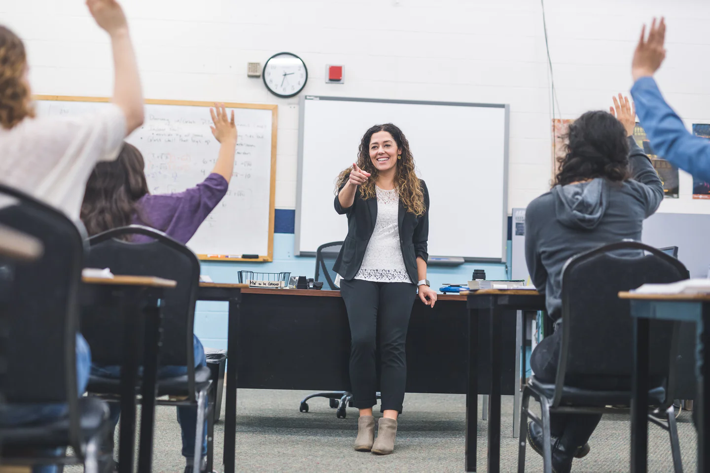 Portrayal of Capella education student leading a classroom of children.