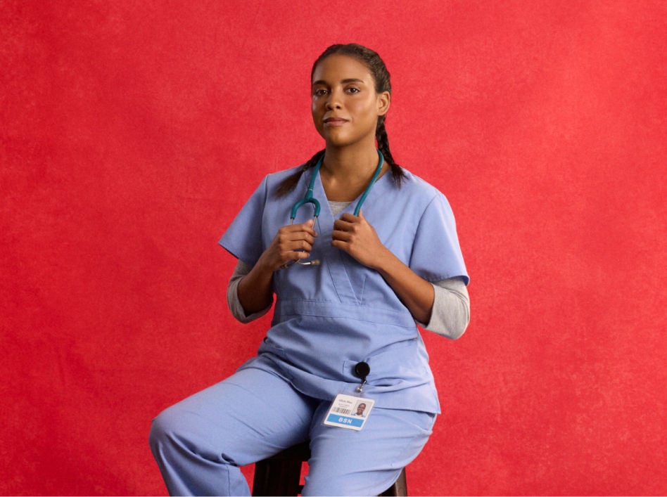 nurse sitting on a stool