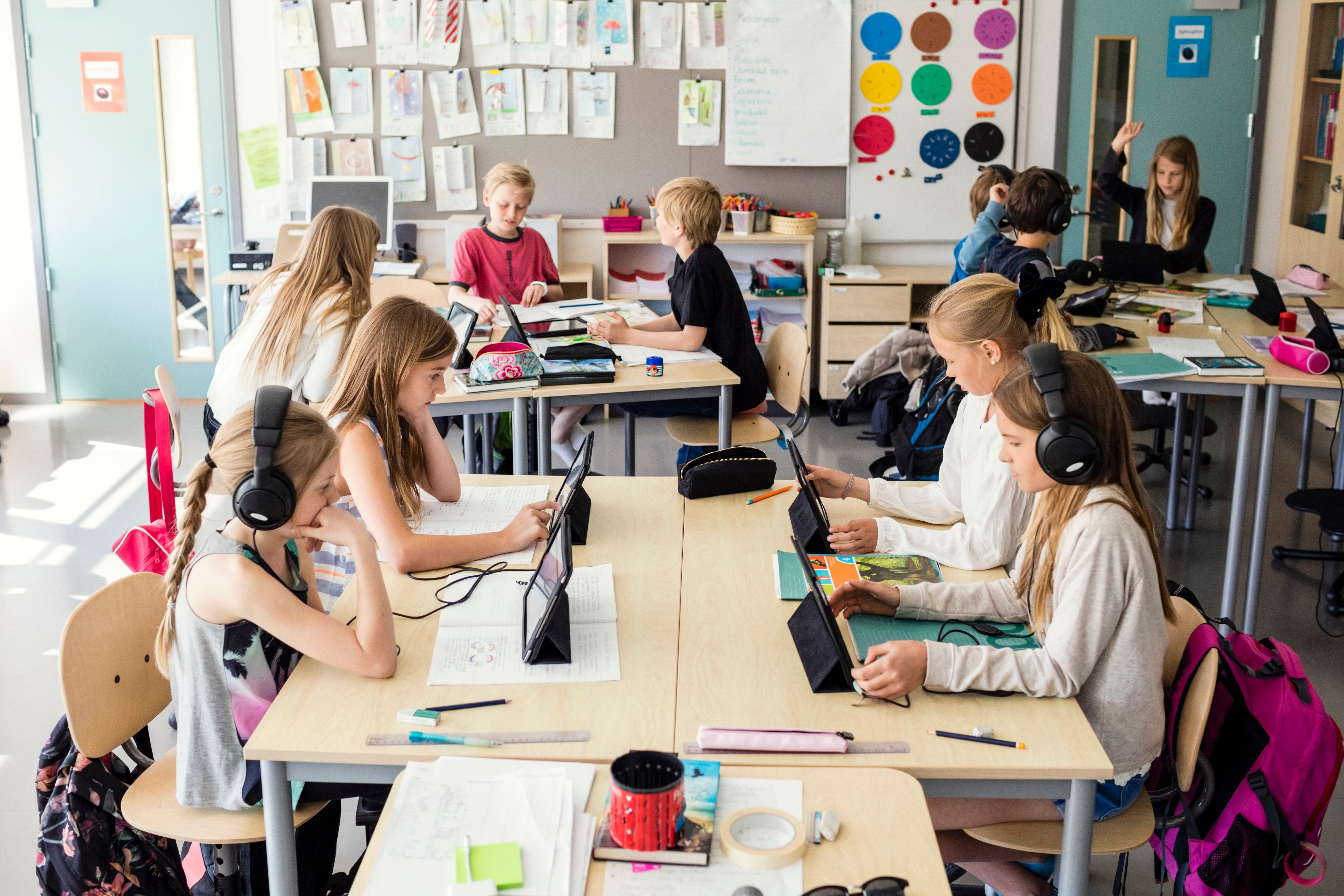 Portrayal of K-12 students using technology in the classroom.