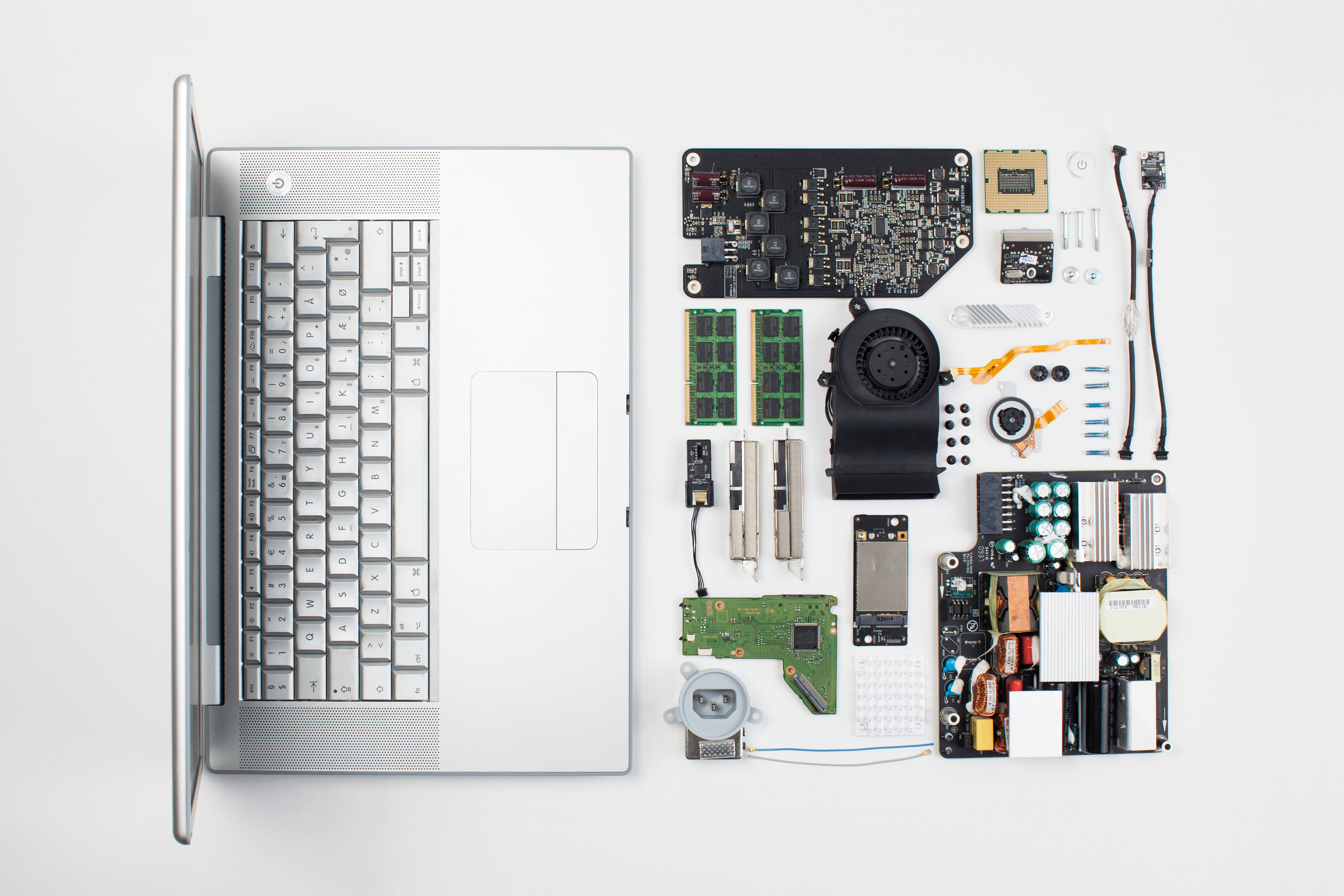 Deconstructed laptop and parts.