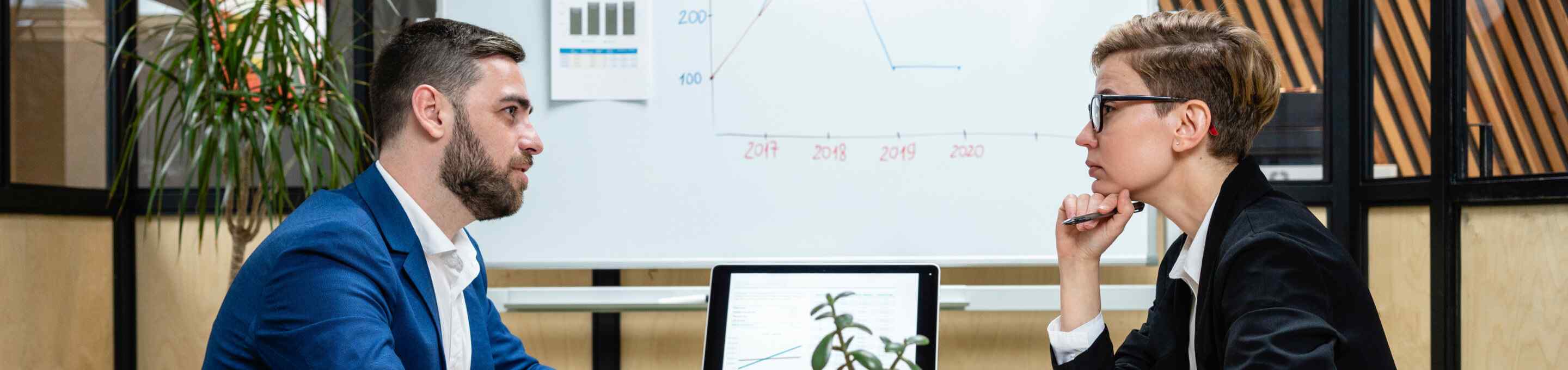 man having a professional interview with a woman face to face