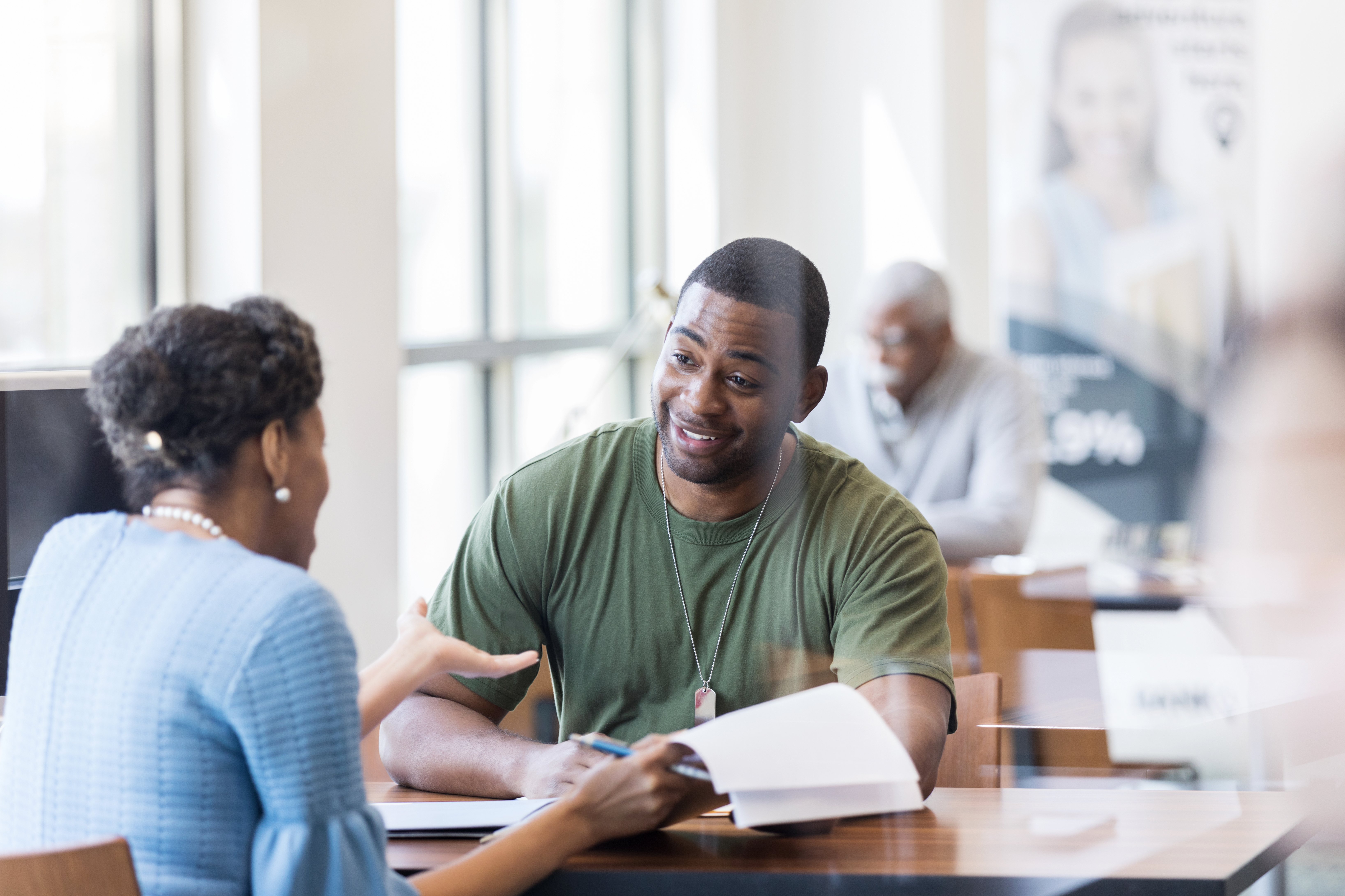 Portrayal of Capella student discussing military benefits with an advisor