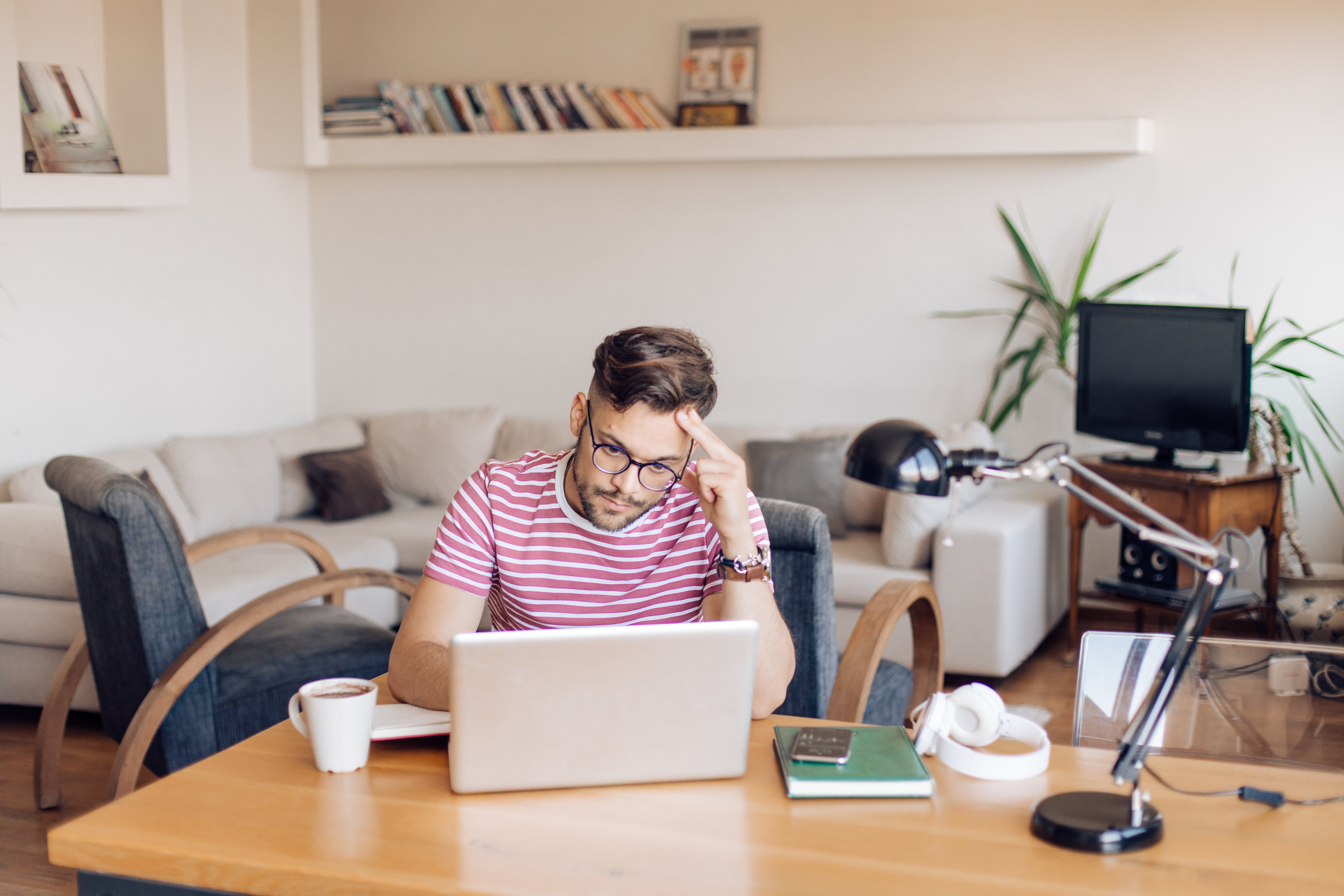 Portrayal of Capella online business student on laptop