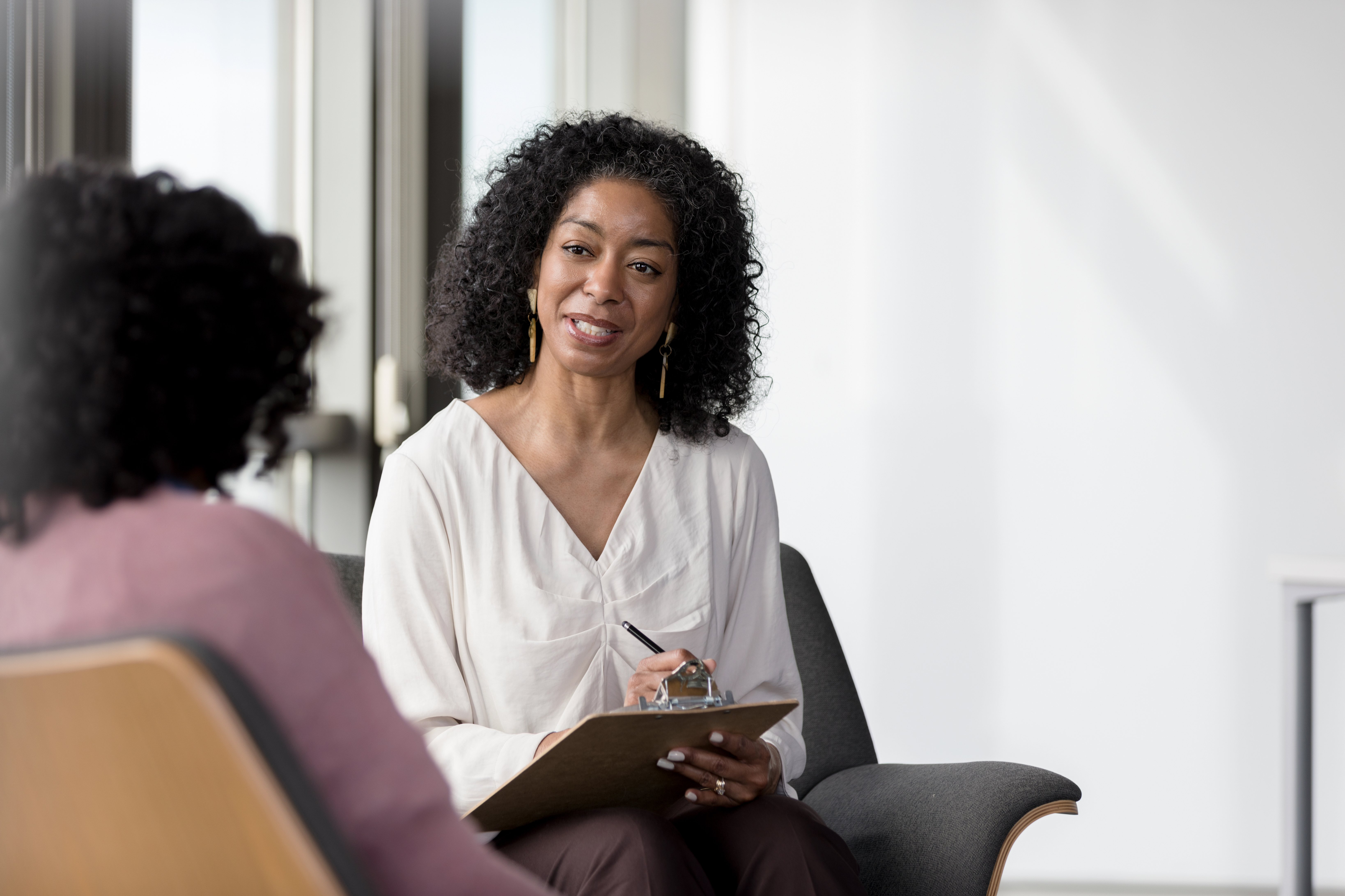 Portrayal of a Capella University applied behavior analysis alum in a therapy session