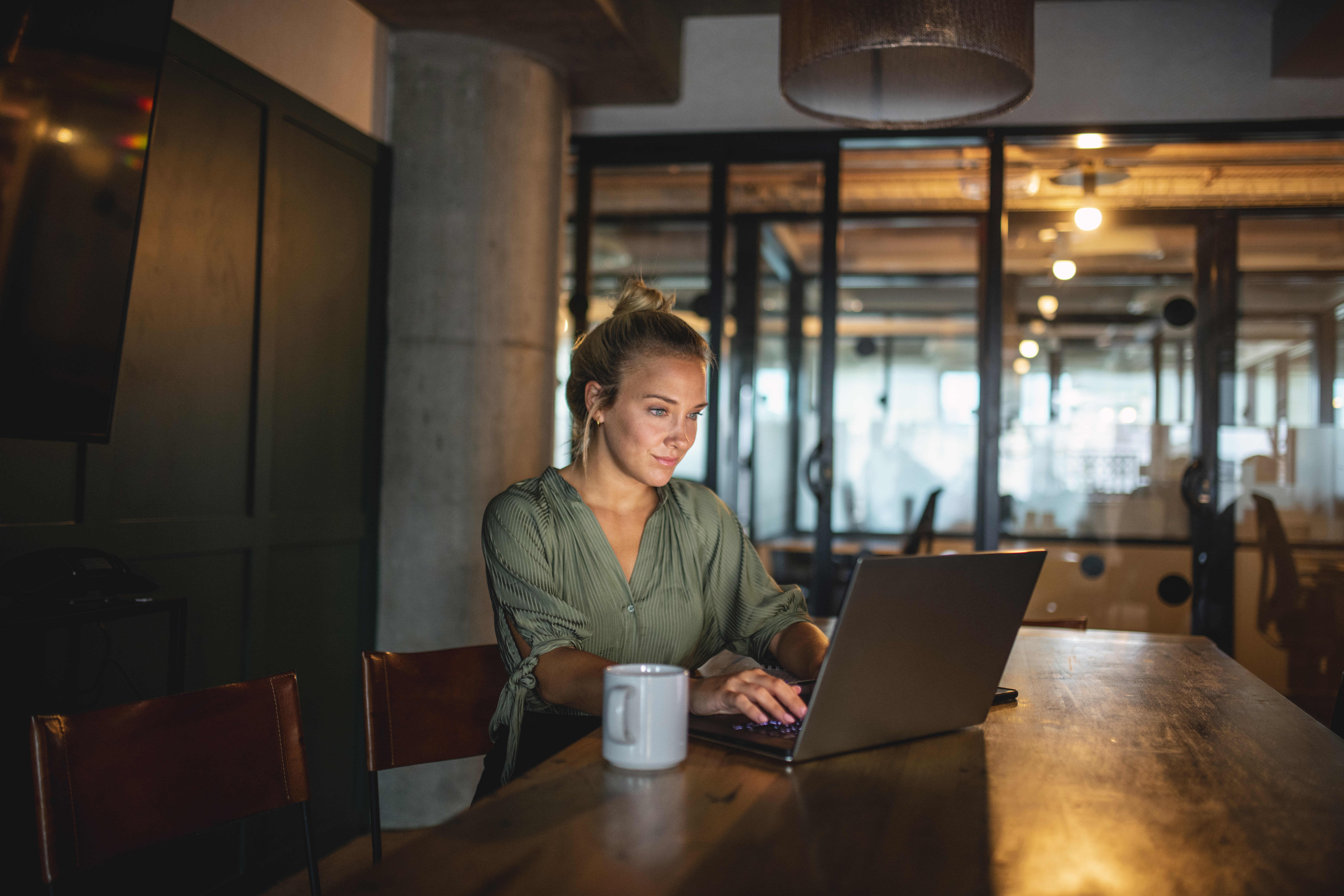 Portrayal of Capella IT student researching security certifications.