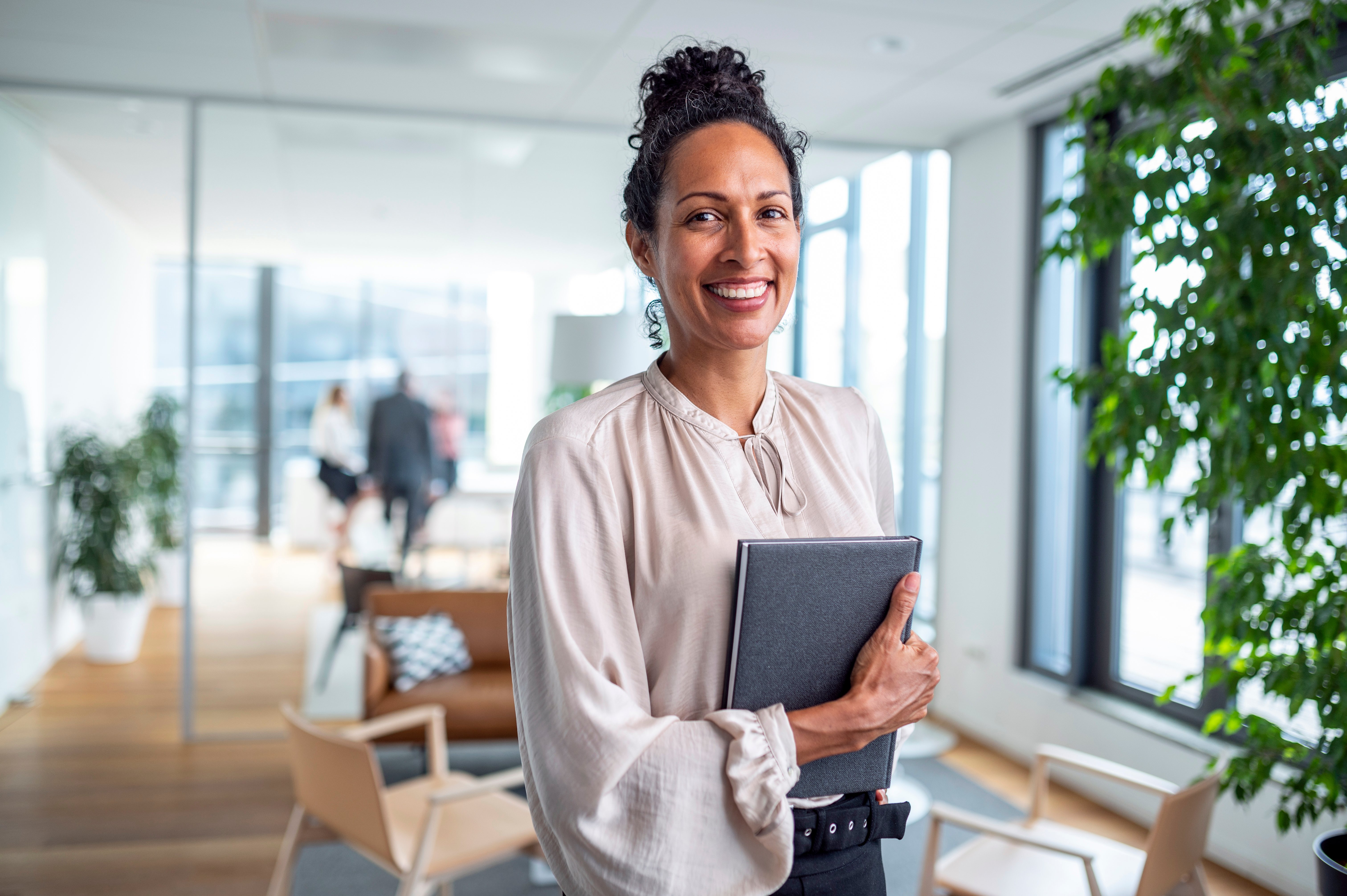 Portrayal of Capella human resource management student in an office