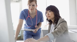 Medical staff at desk