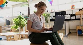 Teacher at computer