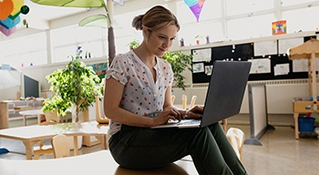 Teacher at computer