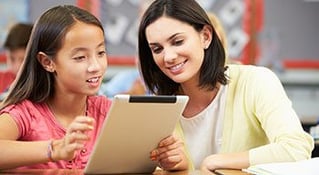Teacher at computer