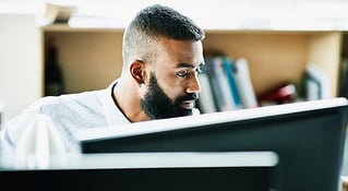 teacher at computer