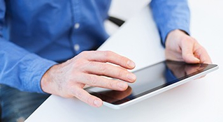 hands working a tablet