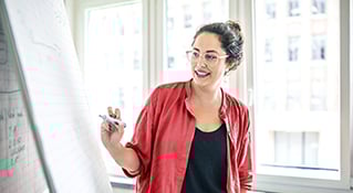 woman reading whiteboard