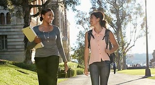 two students walking to or from class